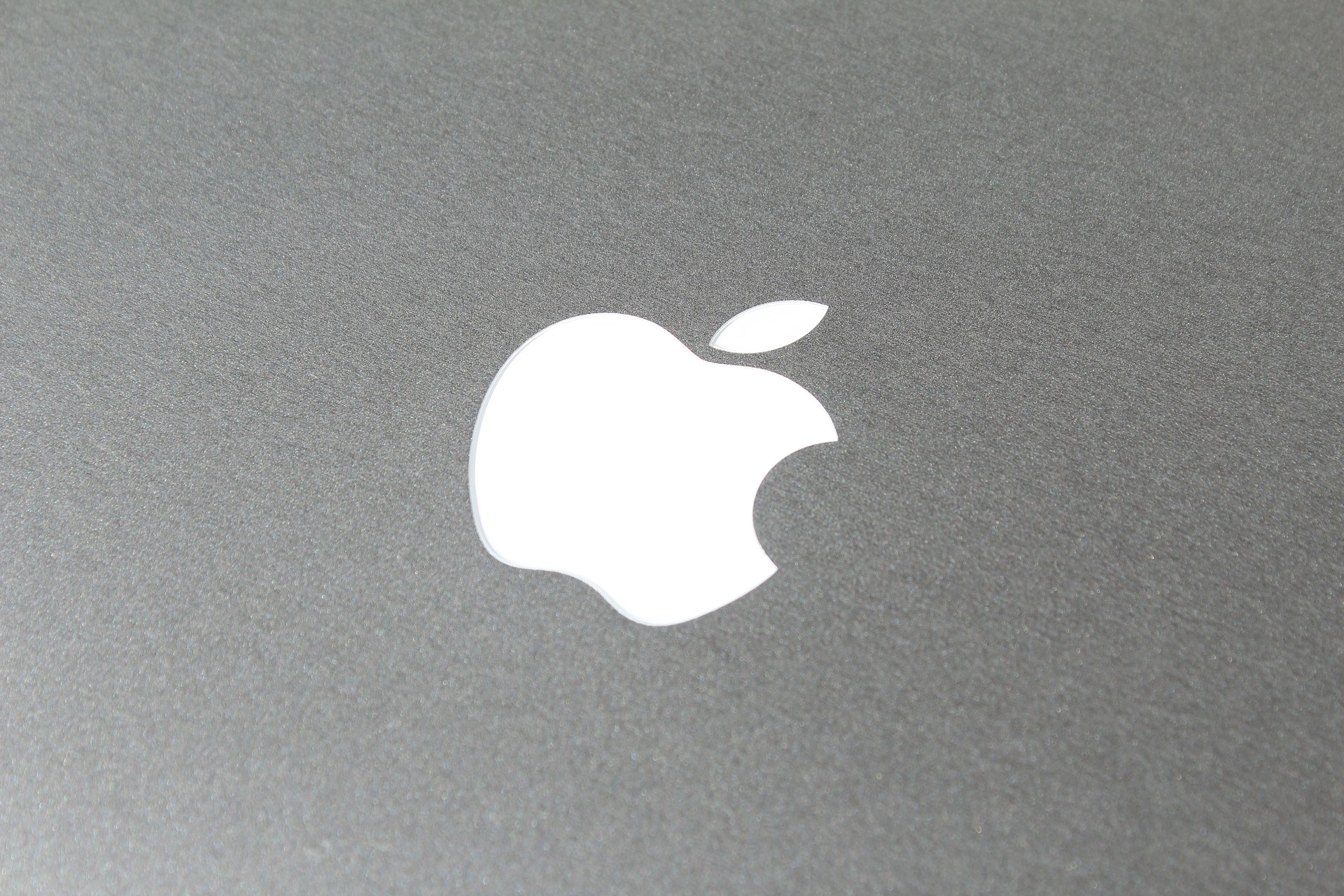 Logo společnosti Apple. Akcie Apple