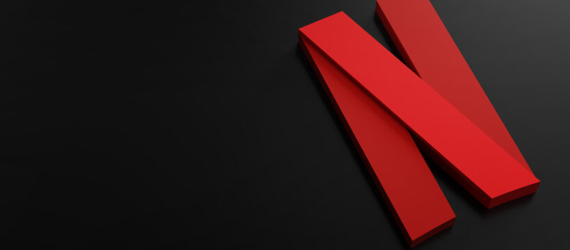 Red angular N shape on a dark, almost black background.